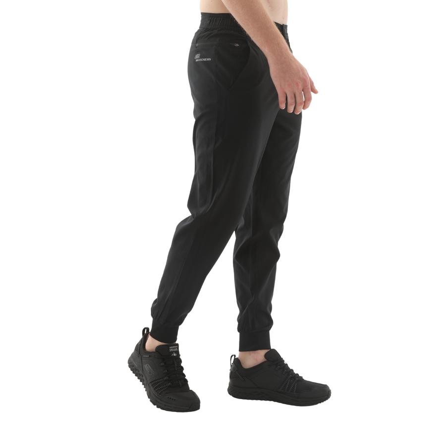 Skechers M Micro Coll. Side Zipper Jogger Fit Pant Erkek Siyah Skechers M Micro Coll. Side Zipper Jogger Fit Pant Erkek Siyah